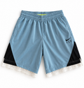 Blue and black reworked vintage Nike basketball shorts with white lace hem, DAMECORE