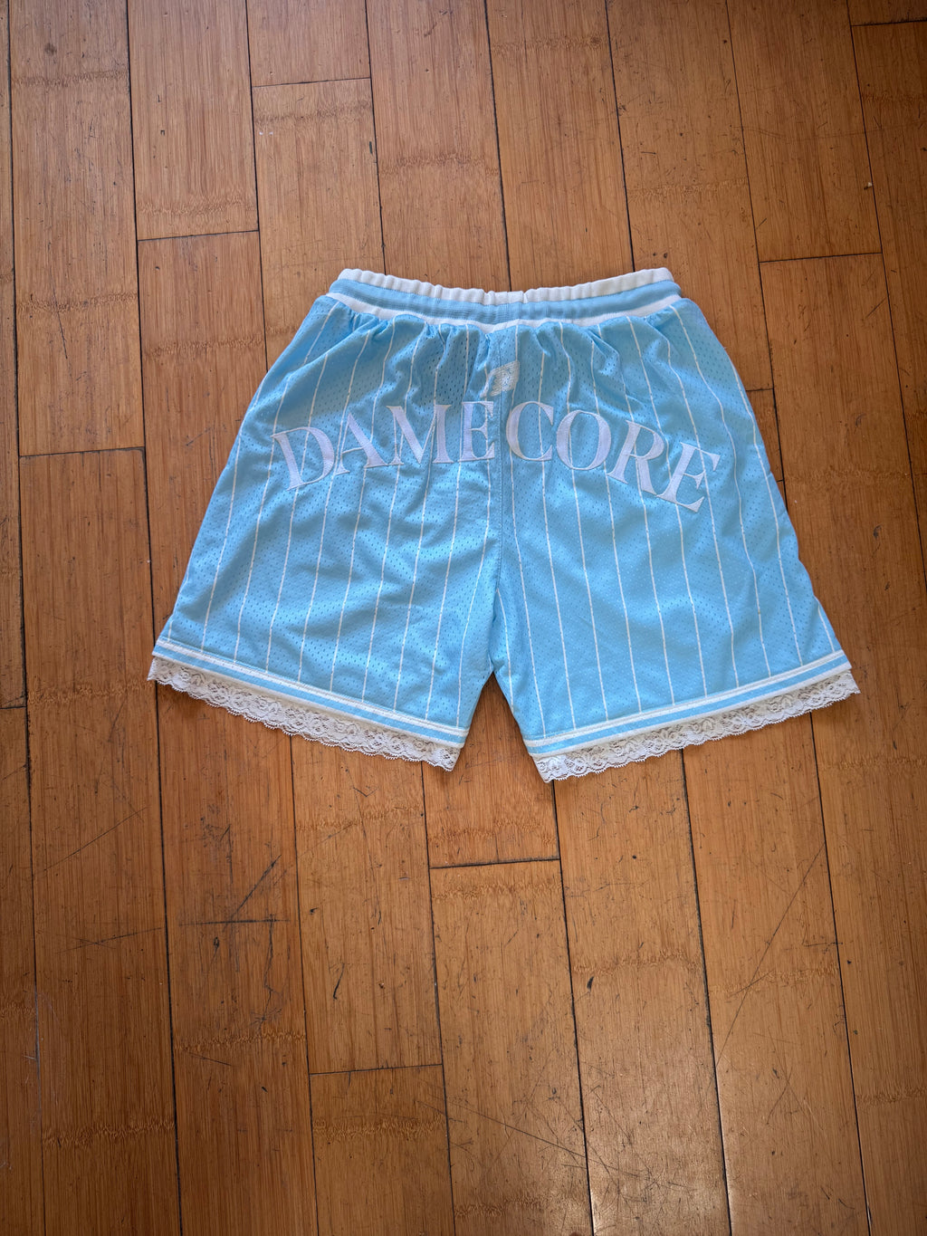 BABY BLUE & WHITE STRIPPED BASKETBALL SHORTS