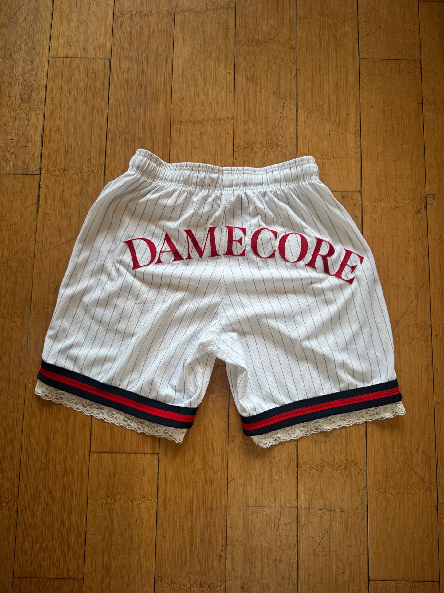 WHITE STRIPED BASKETBALL SHORTS