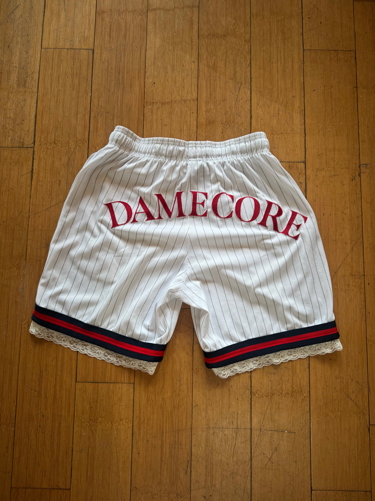 WHITE STRIPED BASKETBALL SHORTS