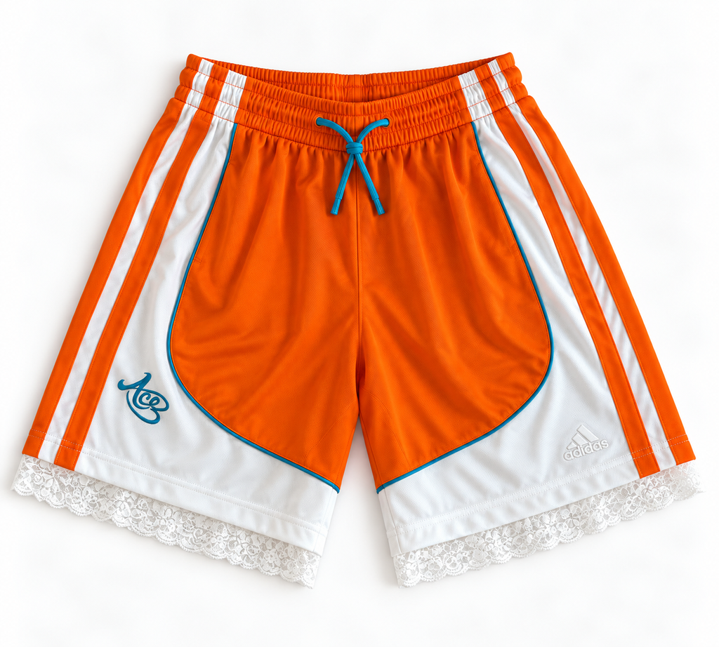 Orange, white and blue reworked vintage adidas basketball shorts with white lace hem, DAMECORE