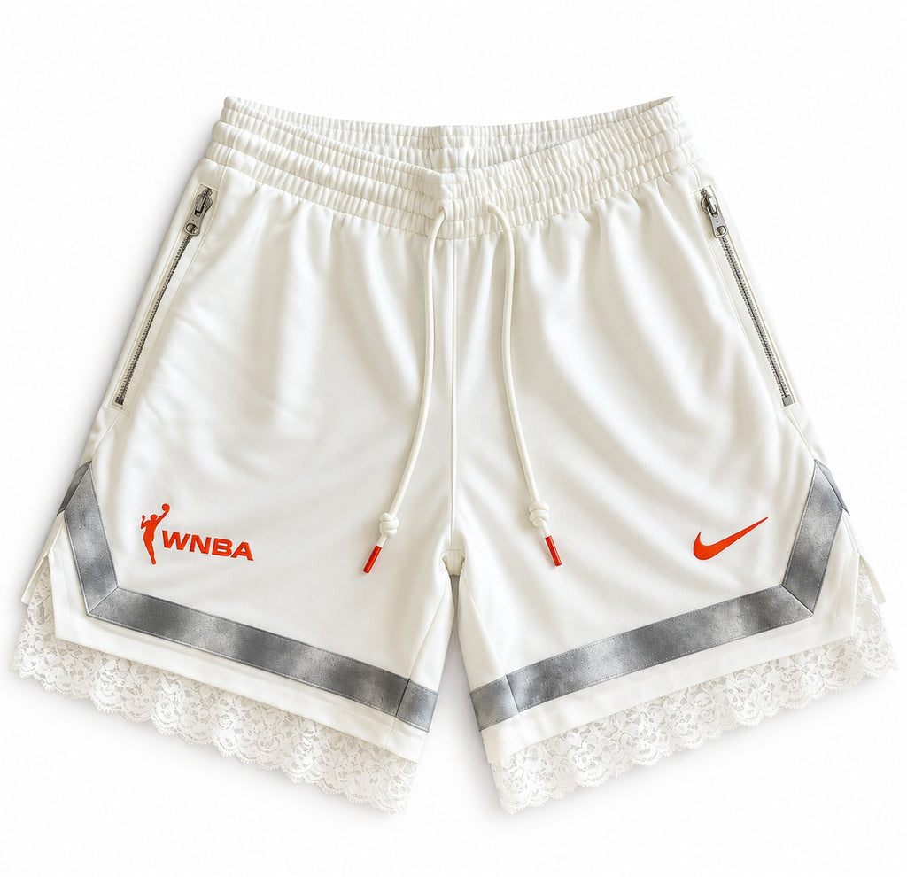 White and orange reworked vintage Nike basketball shorts with white lace hem, DAMECORE