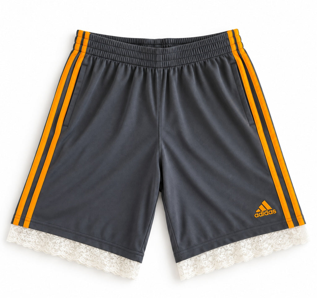 Gray and yellow reworked vintage adidas basketball shorts with white lace hem, DAMECORE
