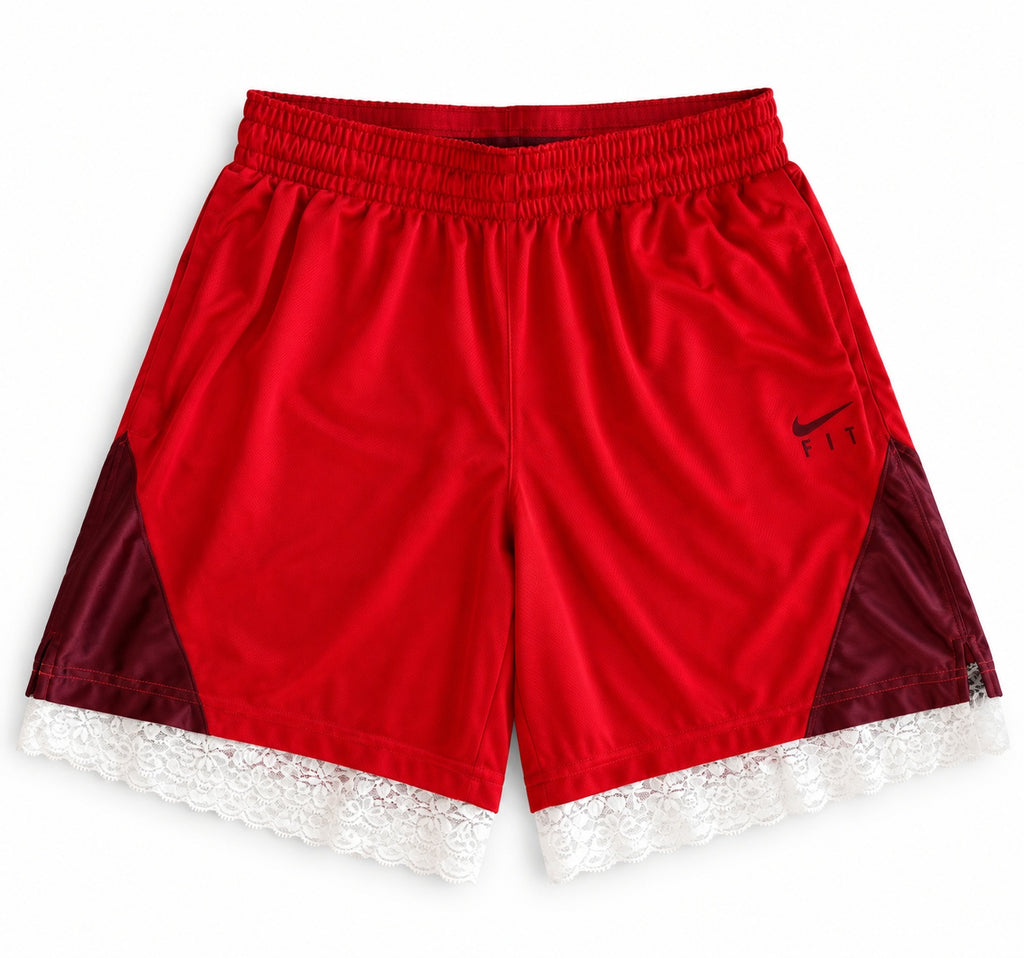Red and maroon reworked vintage Nike basketball shorts with white lace hem, DAMECORE