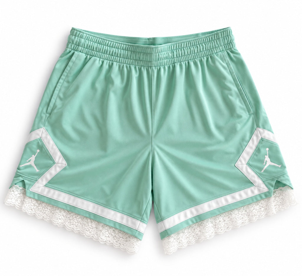 Mint reworked vintage Nike basketball shorts with white lace hem, DAMECORE