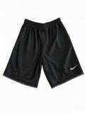 Black reworked vintage Nike basketball shorts with black lace hem, DAMECORE